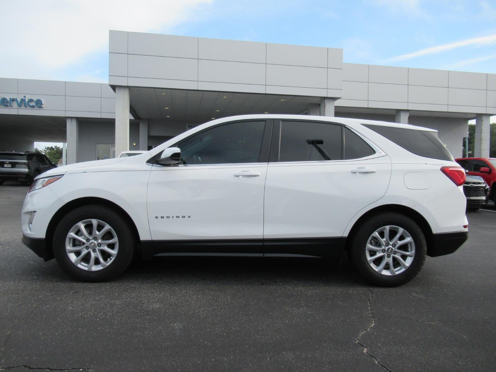 Used 2021 Chevrolet Equinox LT with VIN 3GNAXKEVXMS163437 for sale in Leesburg, FL