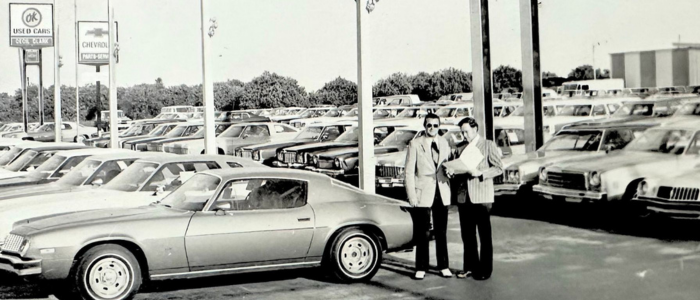 Two Chevrolet Traverse parked together